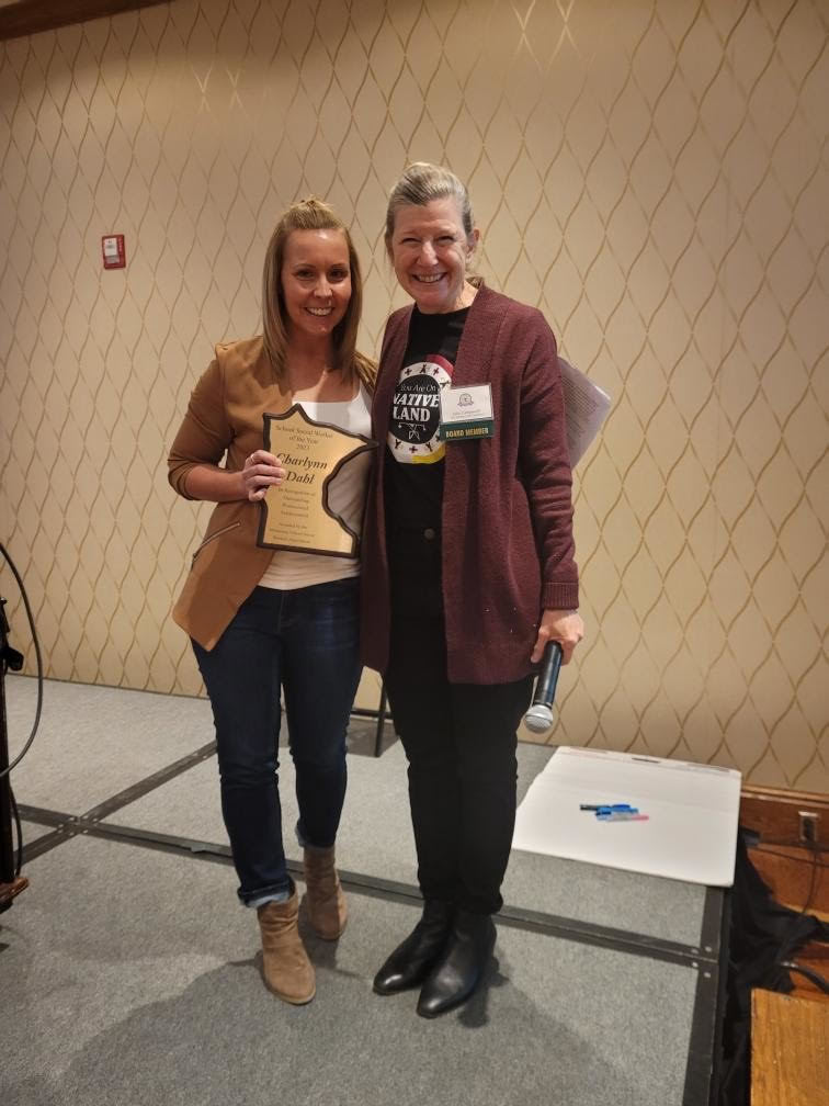 Receiving her plaque.