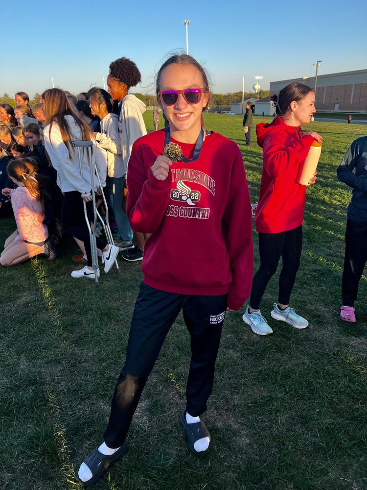 Abi Tri poses with her first place medal