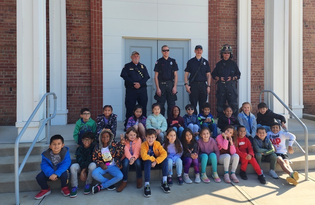 students posing for a picture in front of the school Thank you to the Rockaway Township Fire Department and Marcella company for visiting and speaking to Kindergarten and 2nd grade students!!! #DBOHasHEART