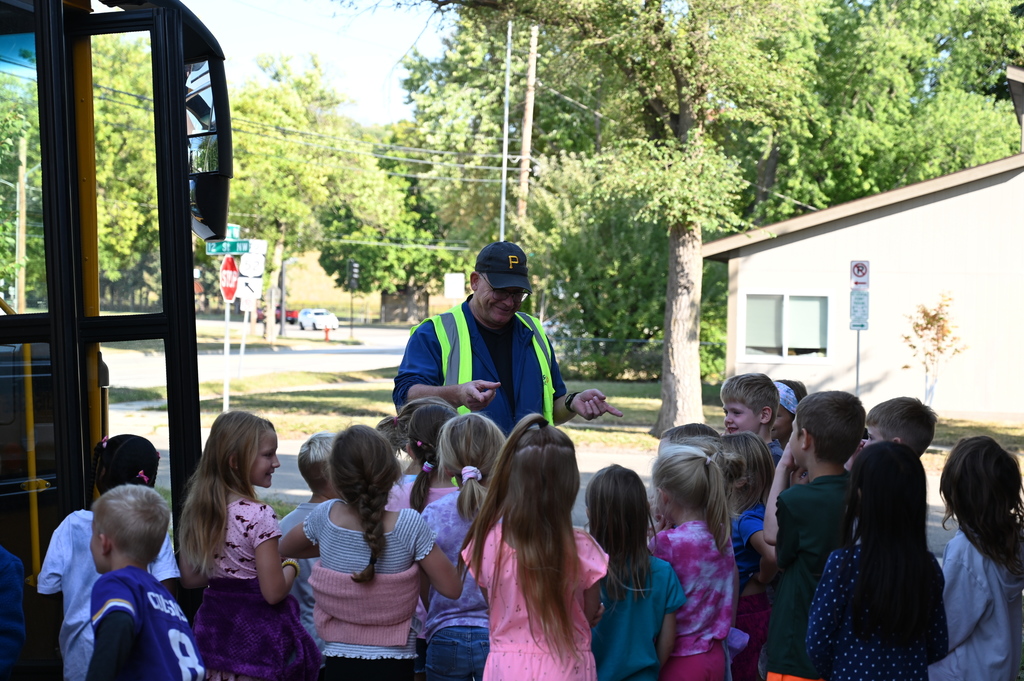Students learning school bus safety