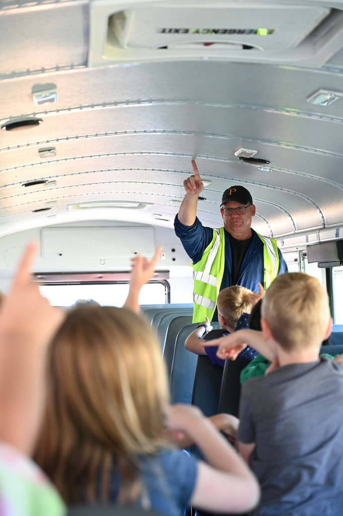 Students learning school bus safety