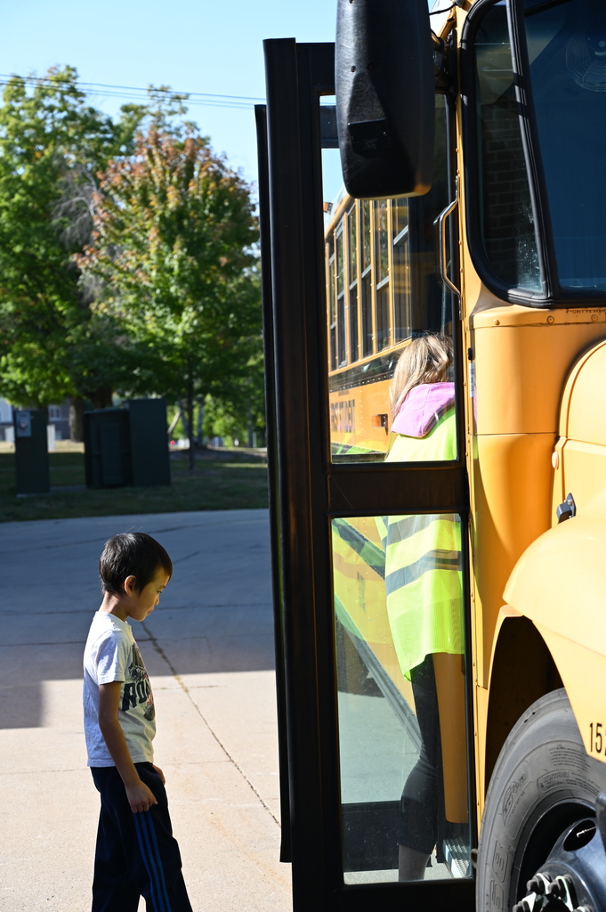 Students learning school bus safety