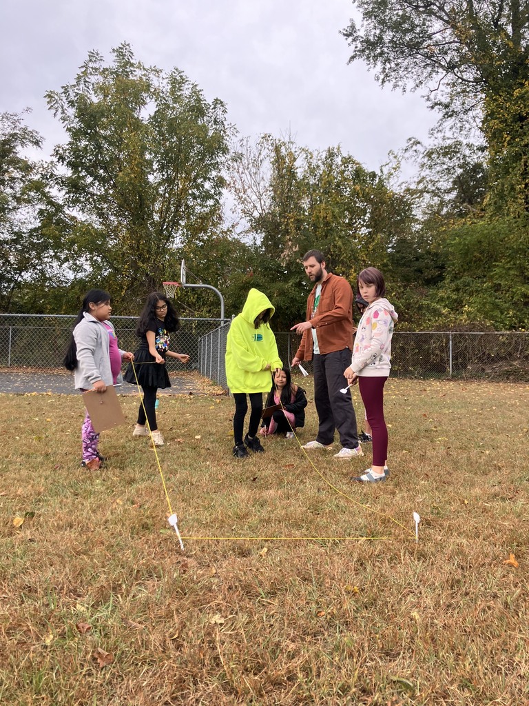 4th graders measuring outside