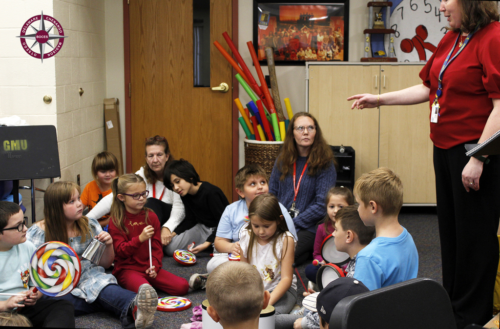 students participate in music class
