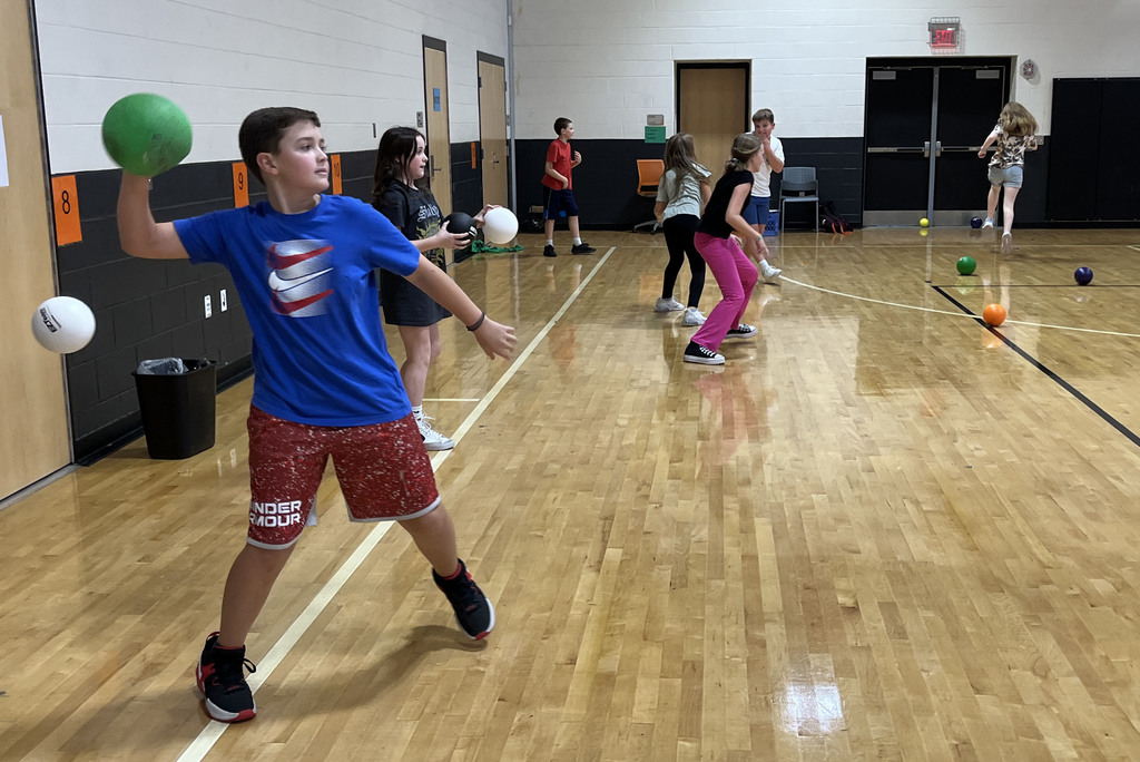 Students play a game called The Matrix in PE class.