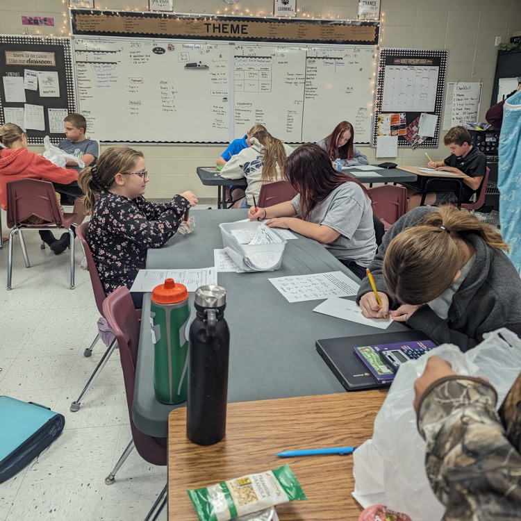 Mrs. Poterbin's sixth grade class wrote in cuneiform like the Mesopotamians.