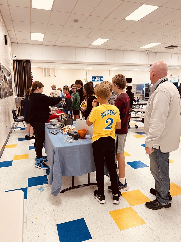 Students and staff in line for some yummy food