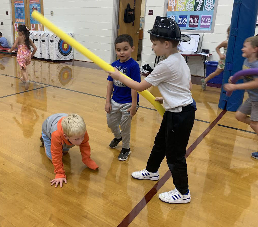 Children participate in Fire Prevention Week activities.