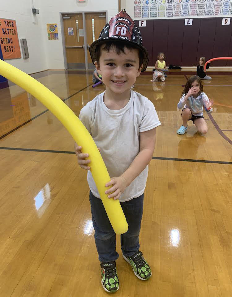 Children participate in Fire Prevention Week activities.