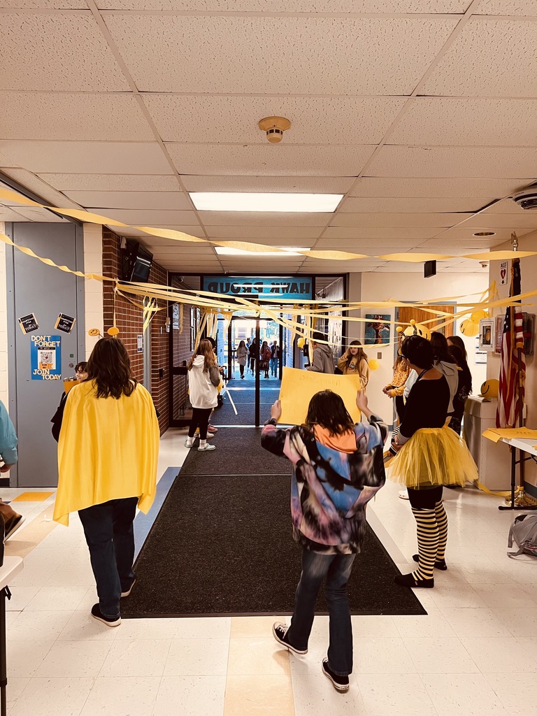 ABC students greeting other students and staff as they enter the building for our smile day celebration