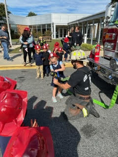 students using a hose