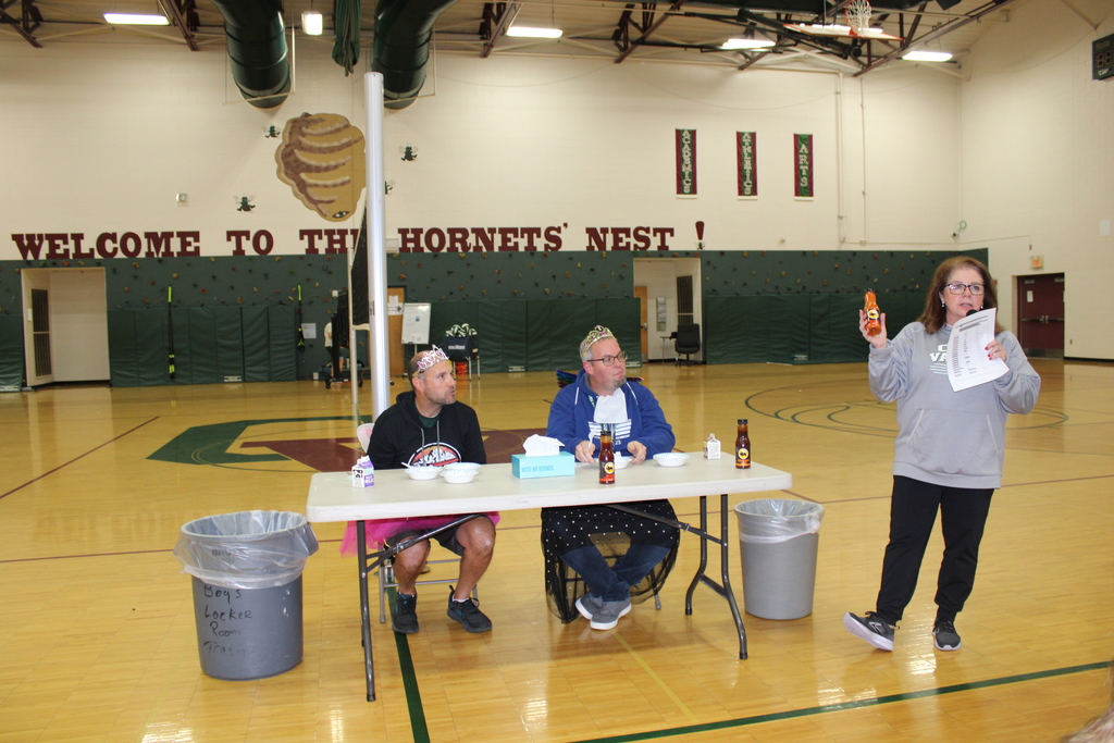 two teachers about to eat hot sauce