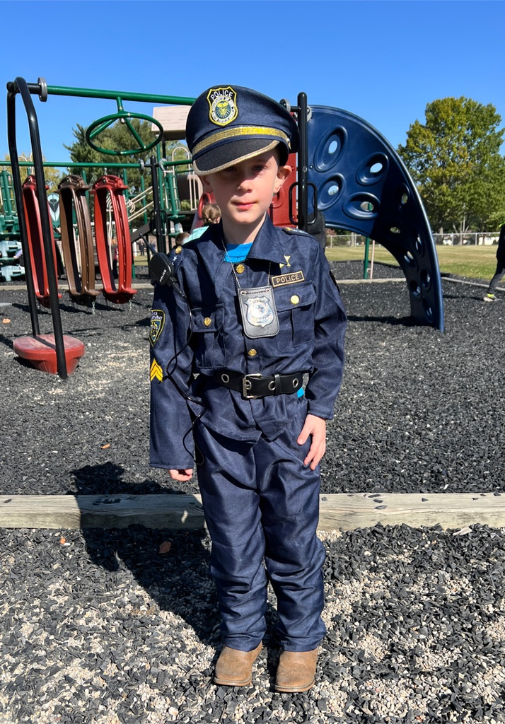 child dressed like police officer