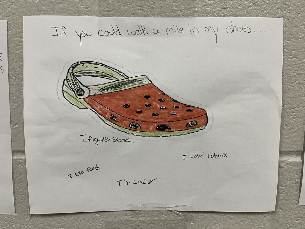 Drawing of a shoe that has been decorated and has text telling about the student who decorated it.