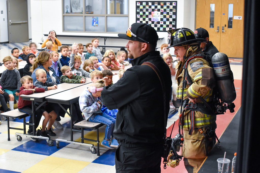 Firefighters talk to students about fire safety