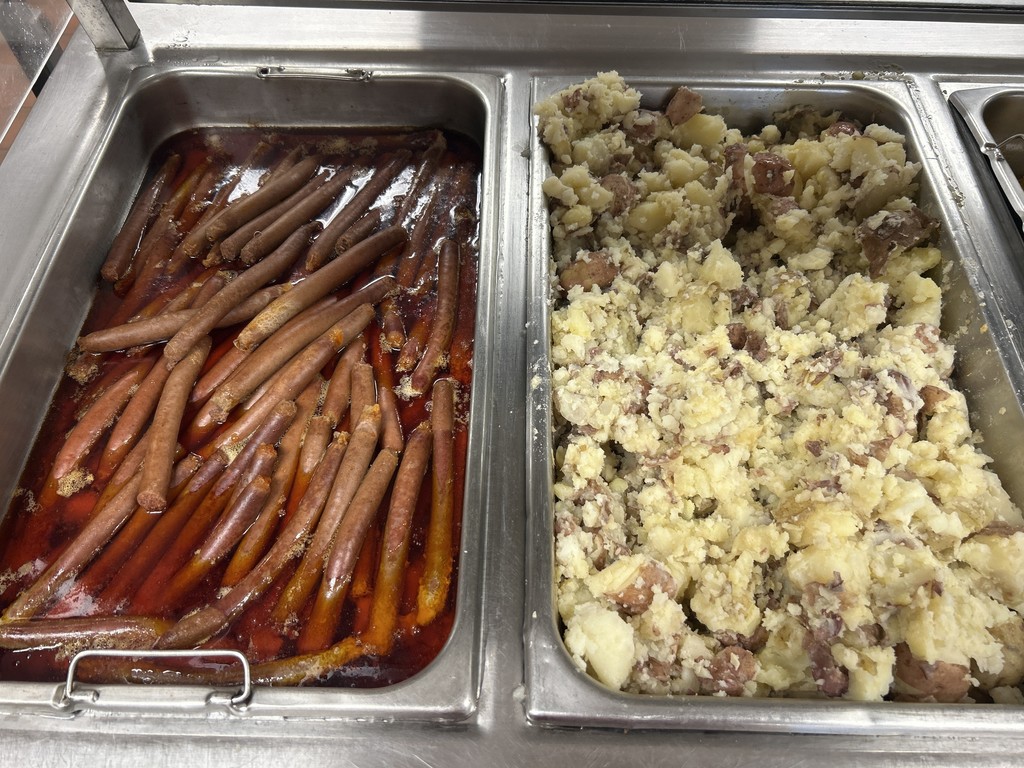 photo of hot dogs and mashed red potatoes