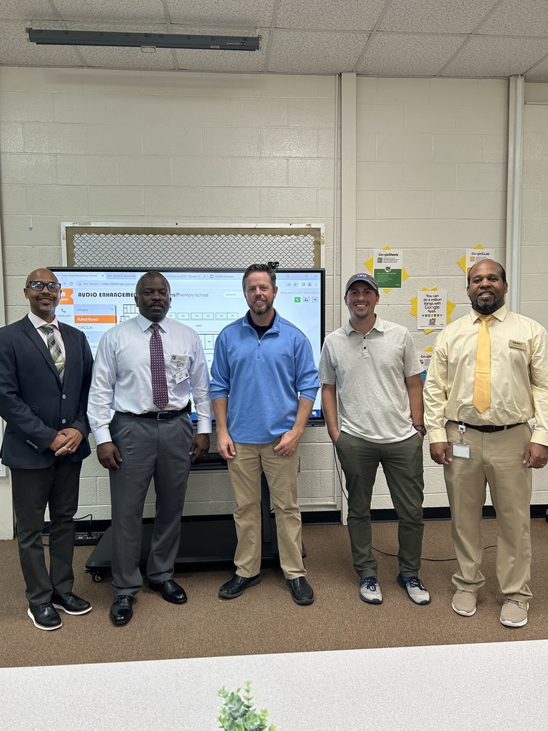 school safety professionals standing in a classroom