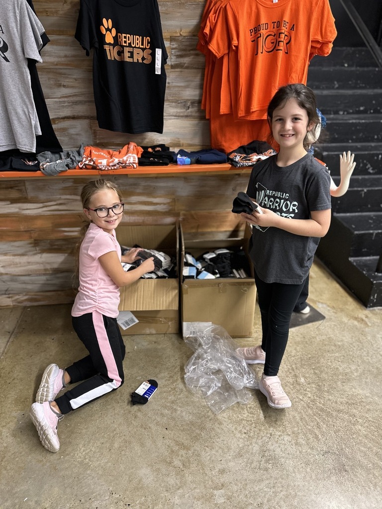 Female students holding socks