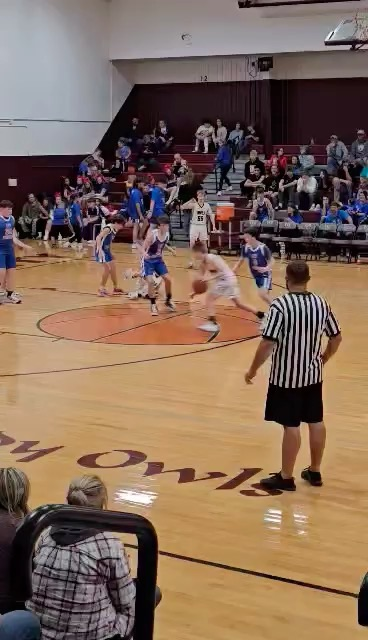 OCMS boys basketball 7th grade game Bryson Bowling attacking the basket