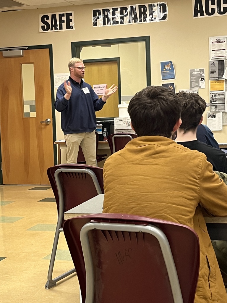 Ian Williams from the Carpenters Union speaks to students