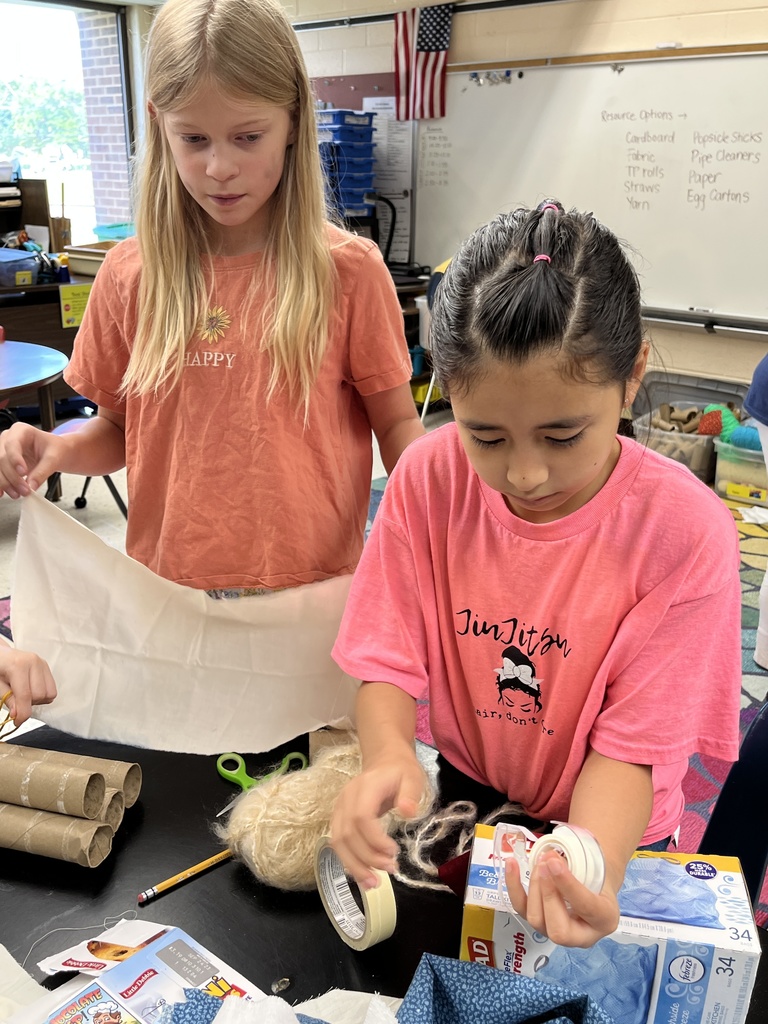 Students make  models of Native Virginia homes.