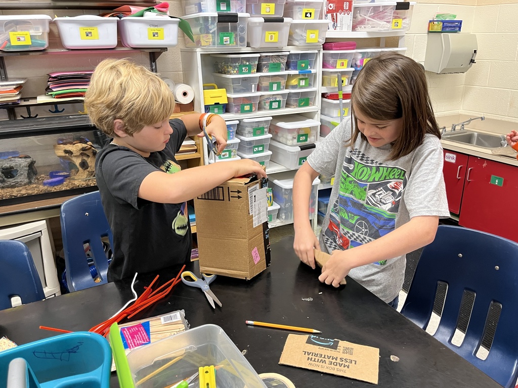 Students make  models of Native Virginia homes.