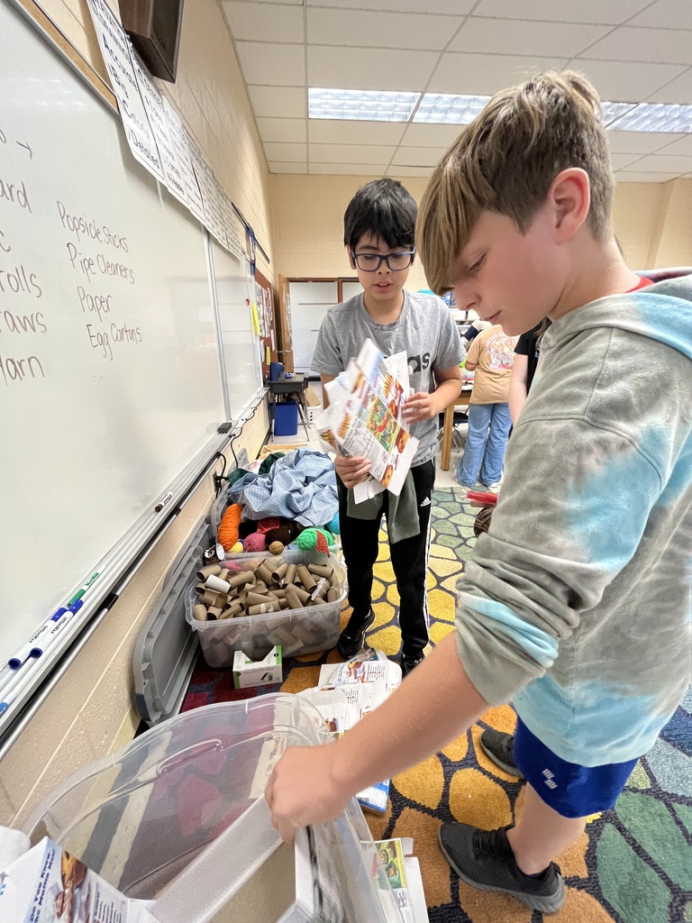 Students make  models of Native Virginia homes.