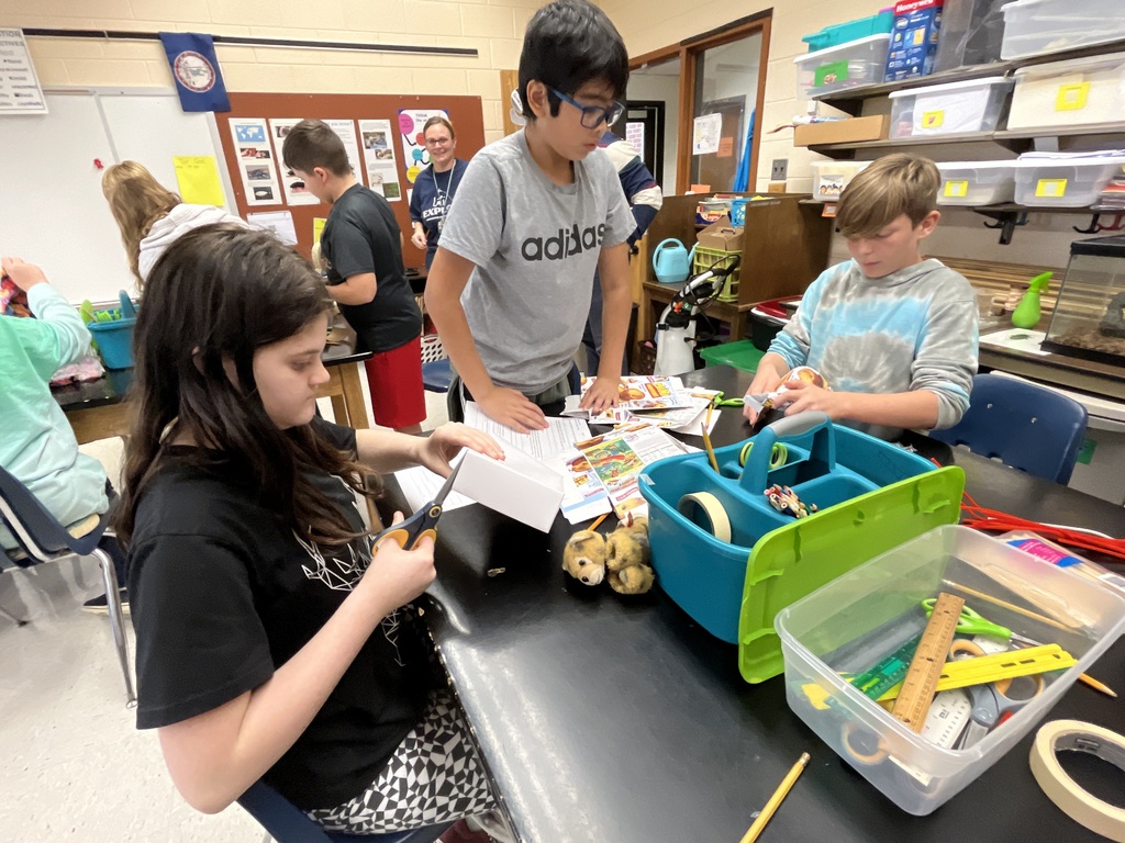 Students make models of Native Virginia homes.