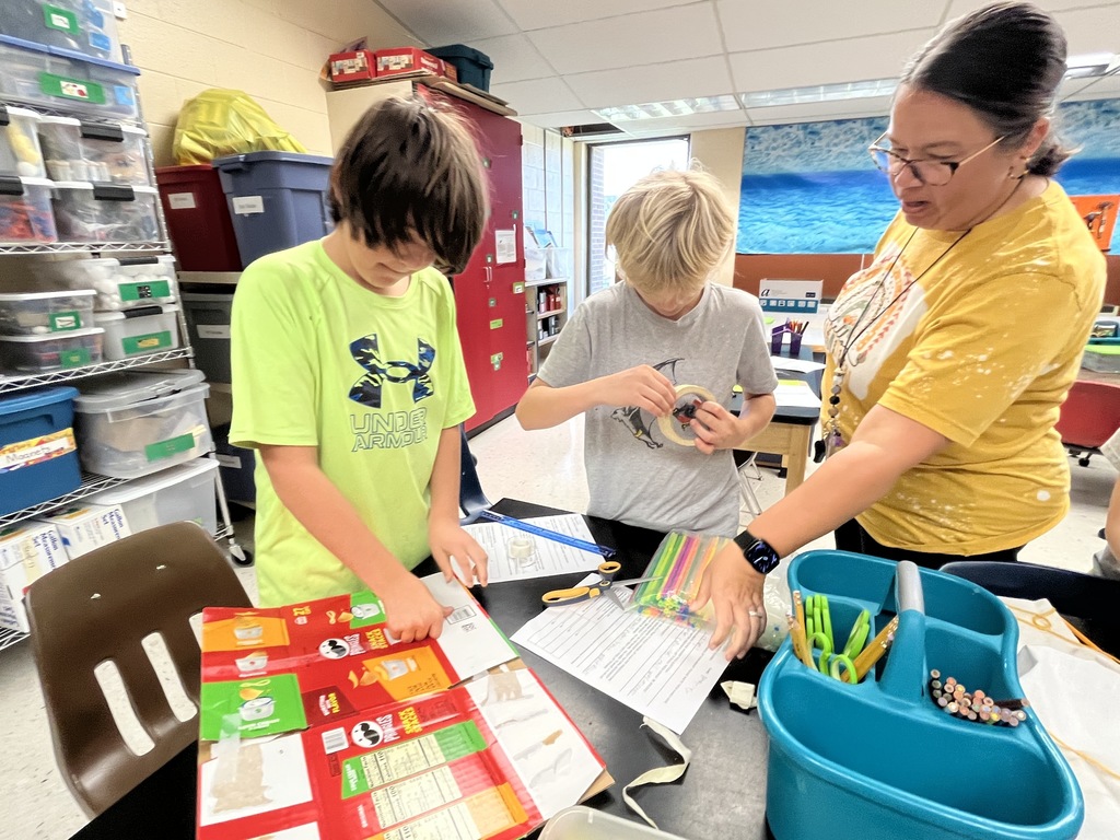 Students make models of Native Virginia homes.