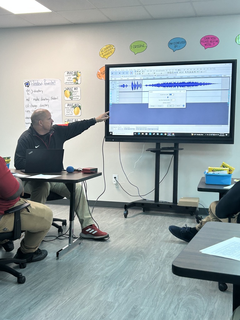 Zack Sims demonstrating how to use audio editing software.