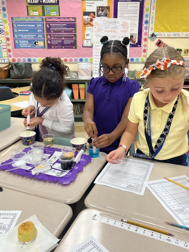 student completing project in classroom