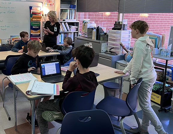 Students work on the second practice problem for Future Problem Solving.