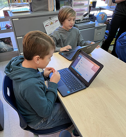 Students work on the second practice problem for Future Problem Solving.