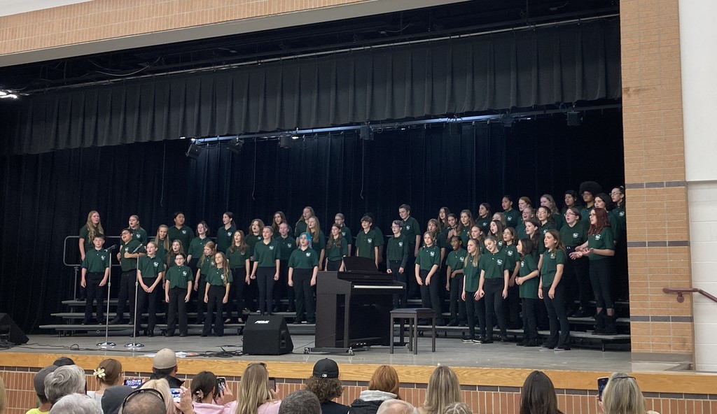 combined choirs sing on risers