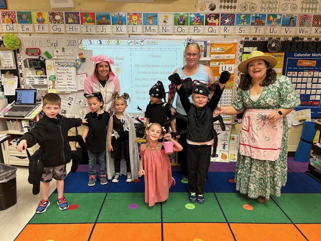 Teachers and students celebrate Nursery Rhyme Day.