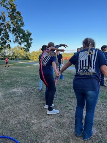 members playing games at meeting