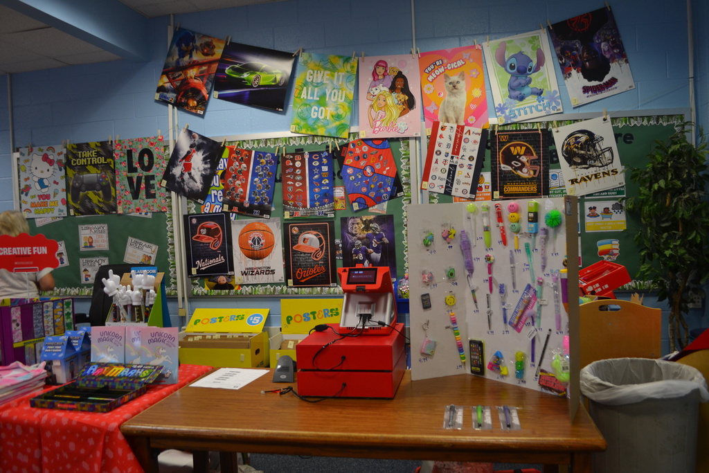 Picture of the scholastic book fair set up in the library.