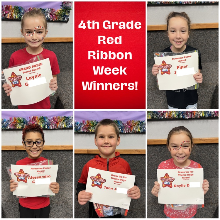 4th grade winners holding award