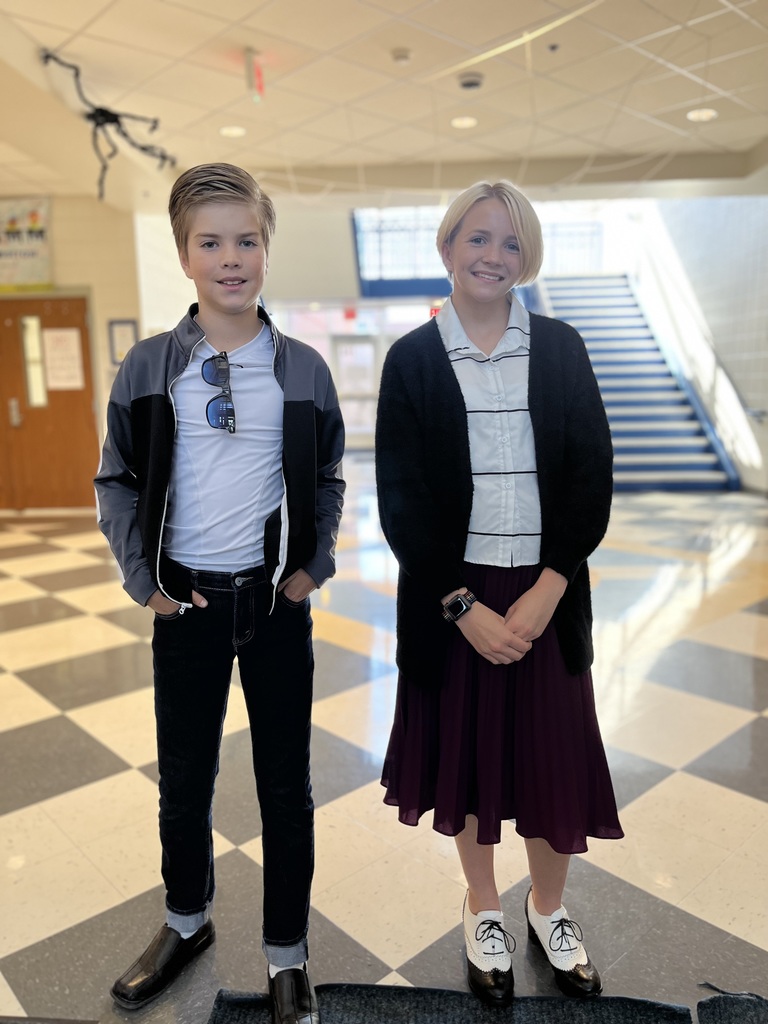 Two students dressed in 50's clothing