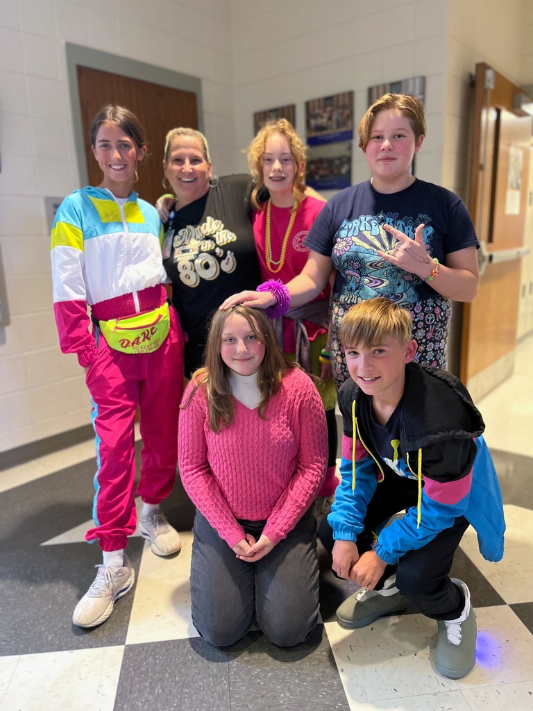 Students and staff dressed in 80's clothing