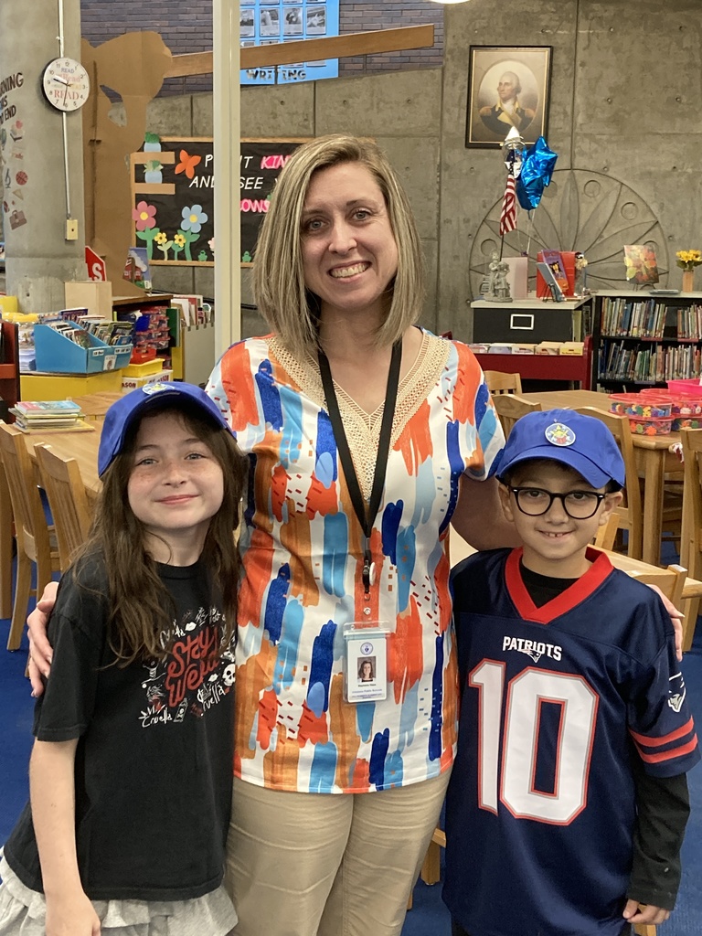 3rd Graders, posed with Mrs. Dalpe, earn their Reading Patch Hats!