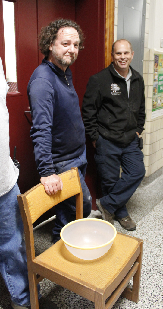 Operations and maintenance staff with an empty candy dish