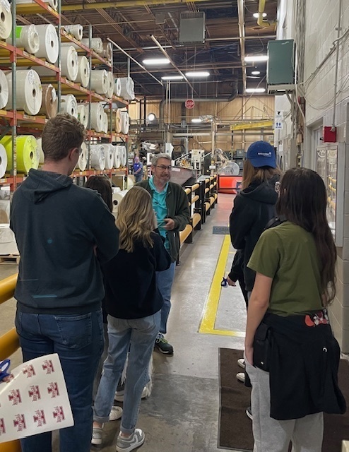 Students tour a plant.
