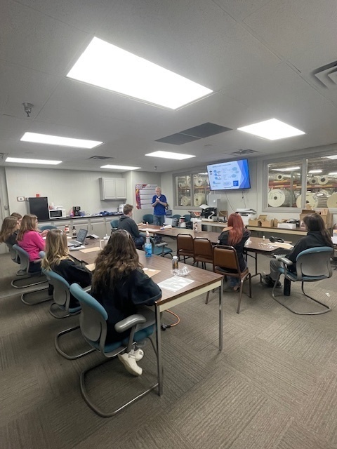 Students learn about manufacturing jobs.