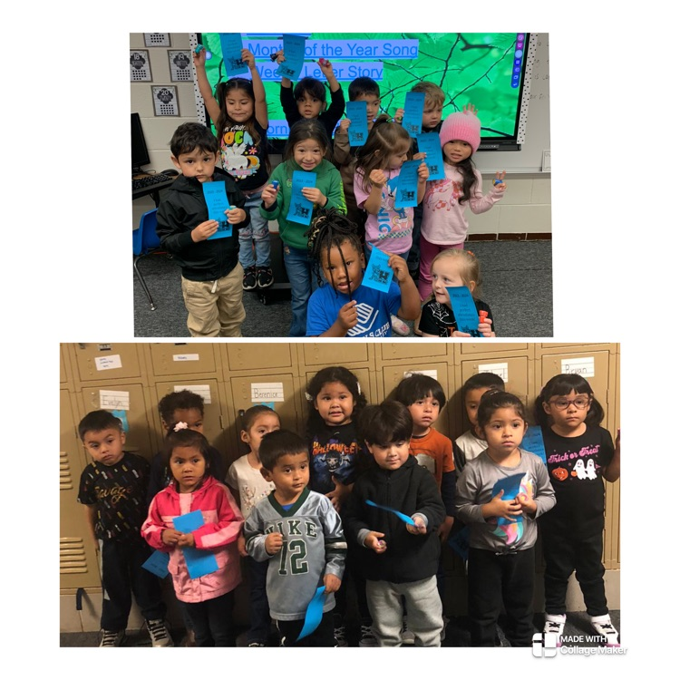 students holding certificates 