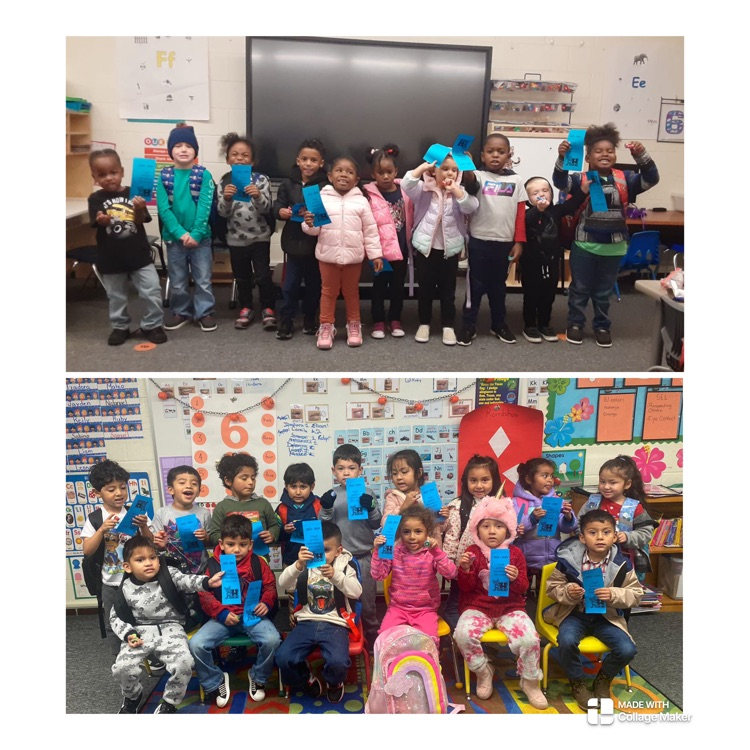 students holding certificates 