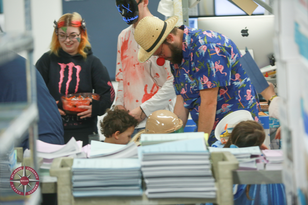 children in cstume visit print shop