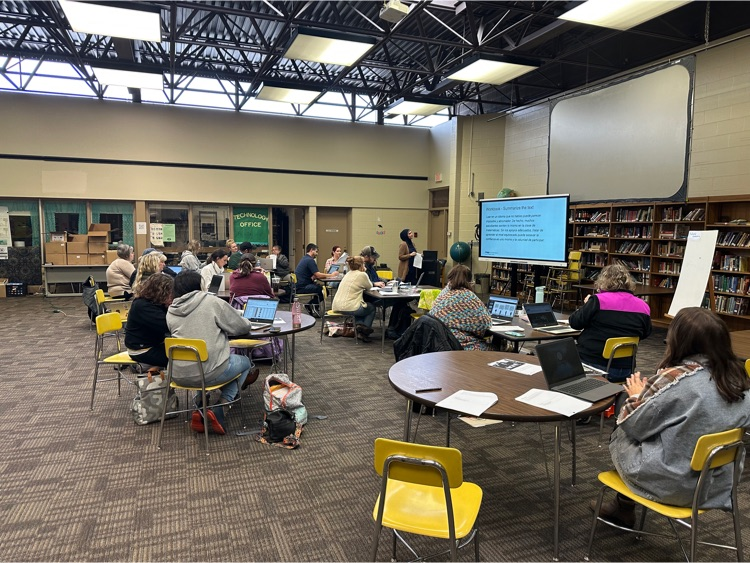 Teachers engaged in training to accelerate math outcomes.