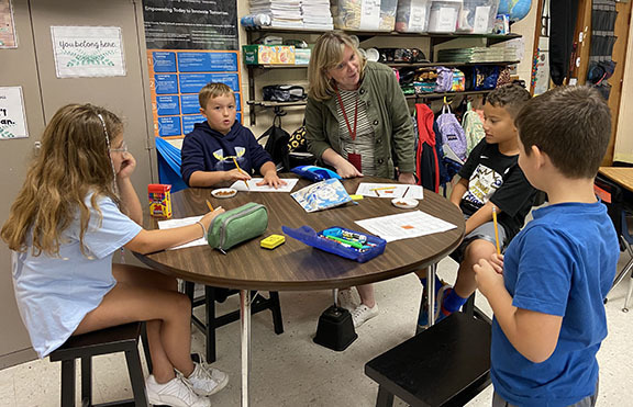 Students learn about soil during STEM Day.