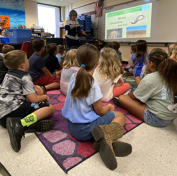Students learn about soil during STEM Day.